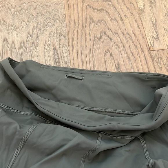 Olive green Lululemon leggings, hit at mid-calf with pockets galore!! - Picture 8 of 9